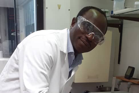 Dr. Ayodele Soge fabricating a dye-sensitized solar cell